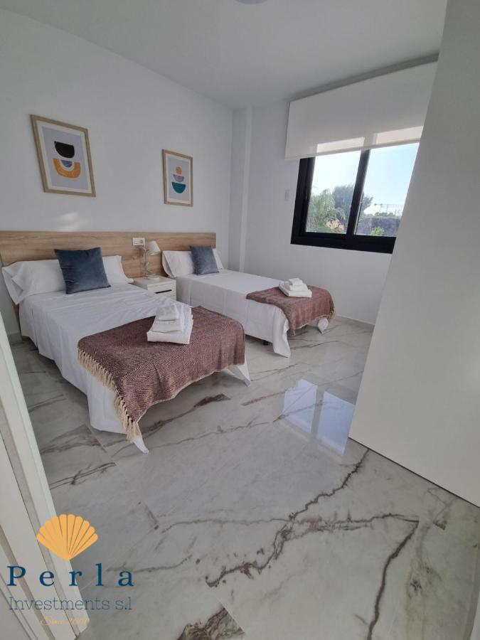 Perla Holidays - 3 Apartamentos De Alta Calidad Dehesa de Campoamor  ภายนอก รูปภาพ